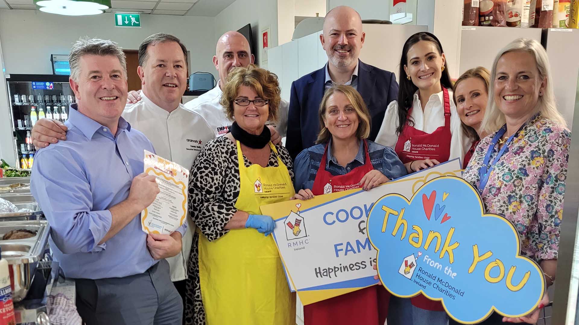 Cooking for Families_Group holding Photo prop