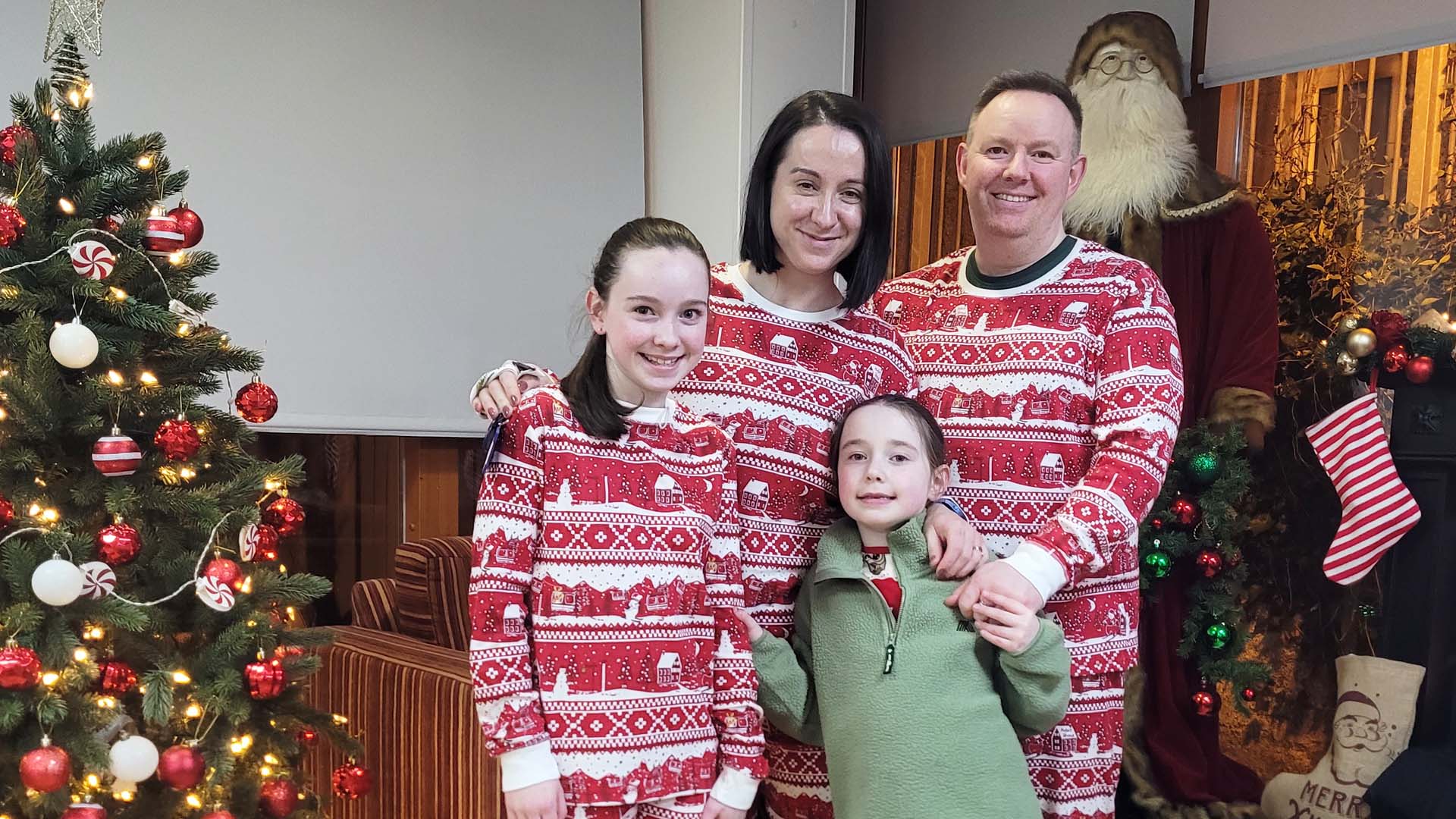 Family in Christmas pyjames