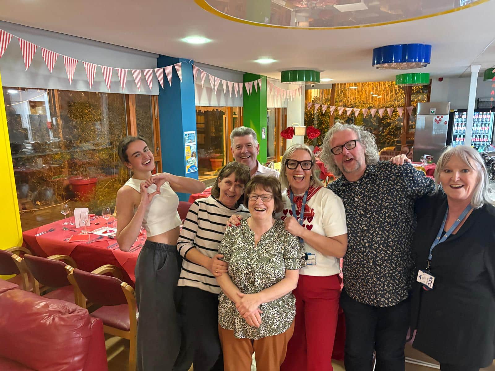 Group photo of people smiling at RMHC house