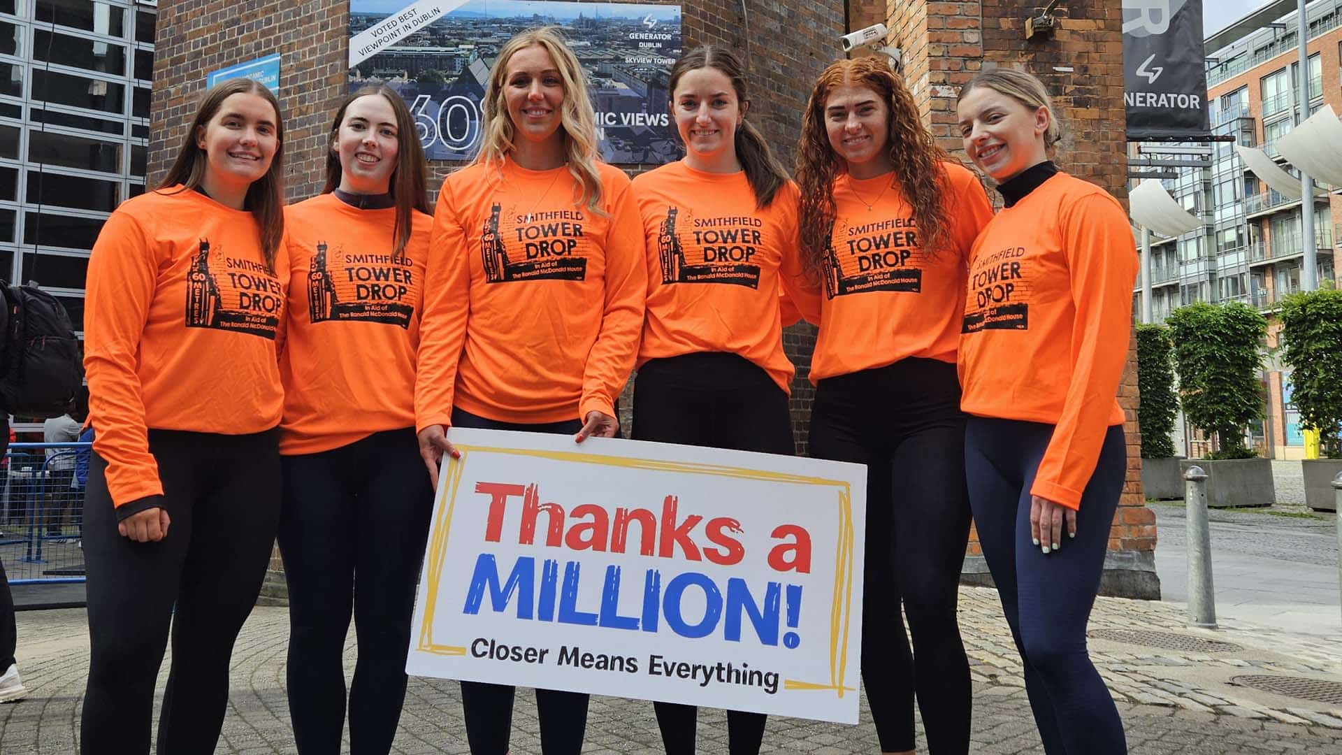 RMHC abseil event group of girls smiling at camera